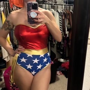 Wonder woman outfit NWT, there is loose stitching on the waist -see pics